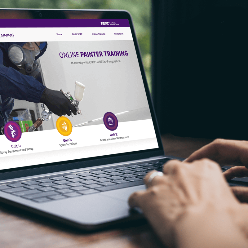 Link, online Painter Training landing page visible on laptop screen