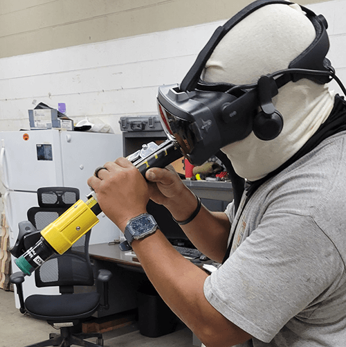 Link, a student practices proper technique using the VirtualPaint interactive 3D simulation