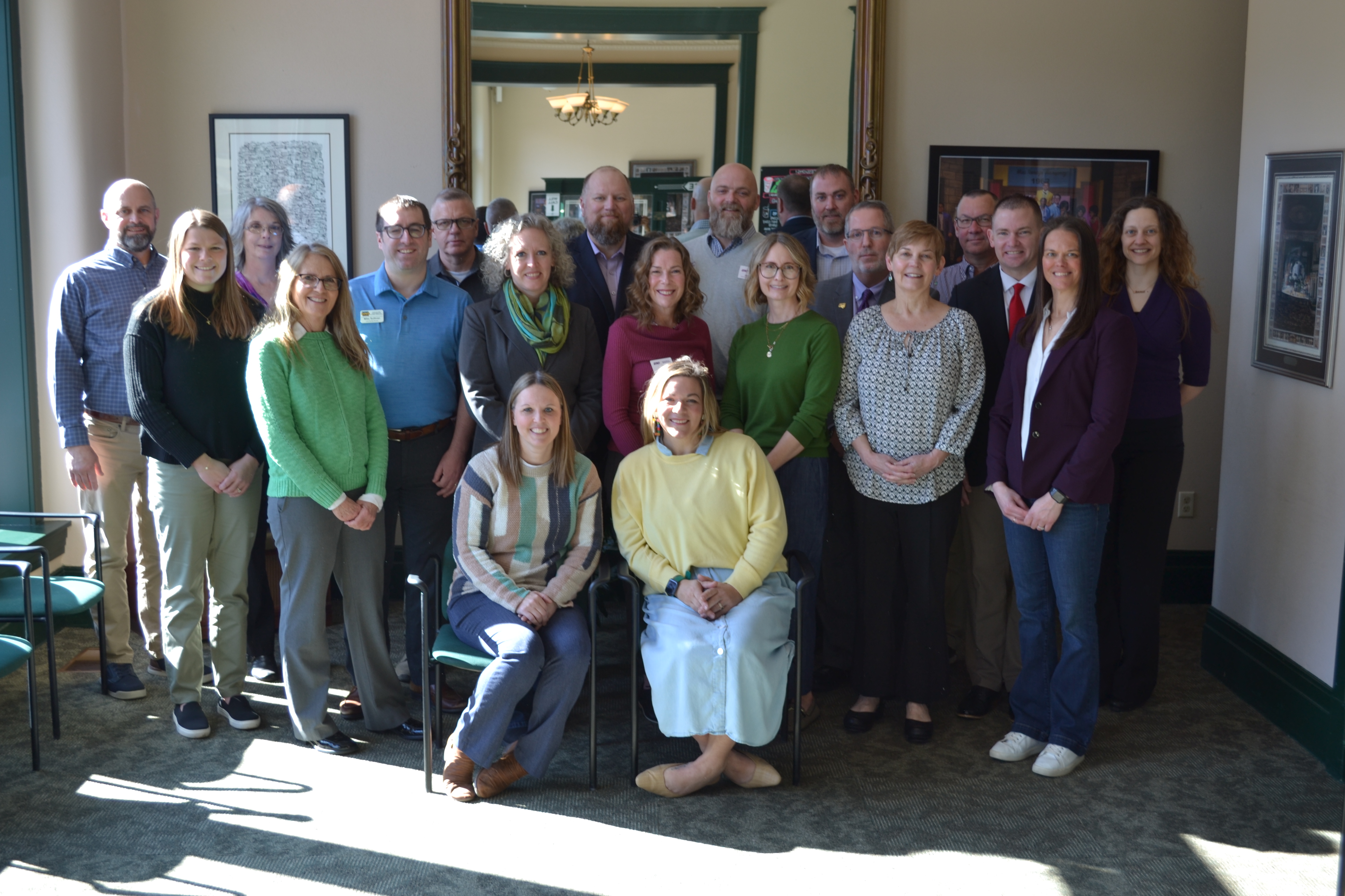 Group of professionals gathered for a photo before annual advisory board meeting