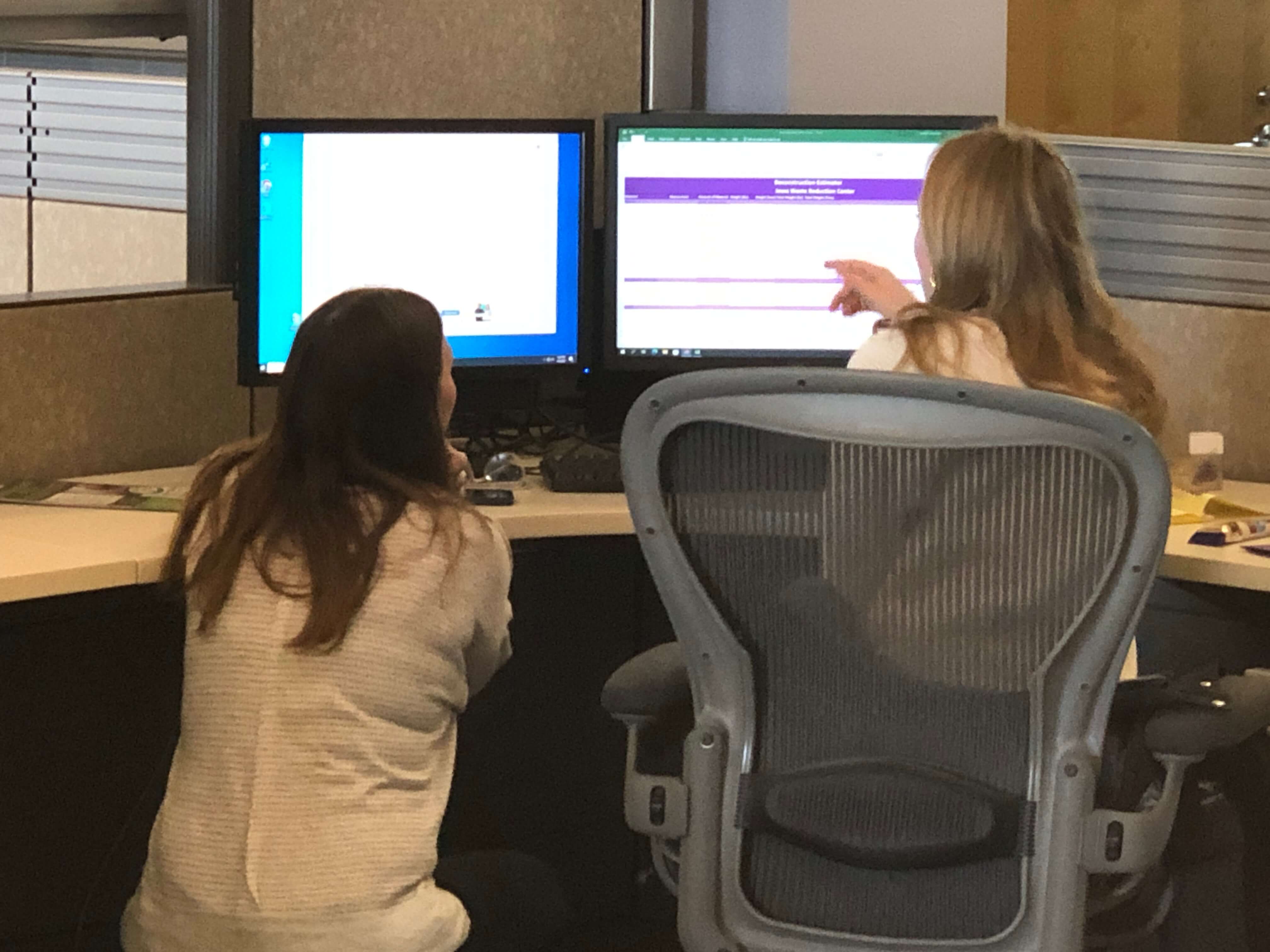 IWRC Program Manager Jennifer Wittenburg working with Environmental Intern Kendall Lienemann