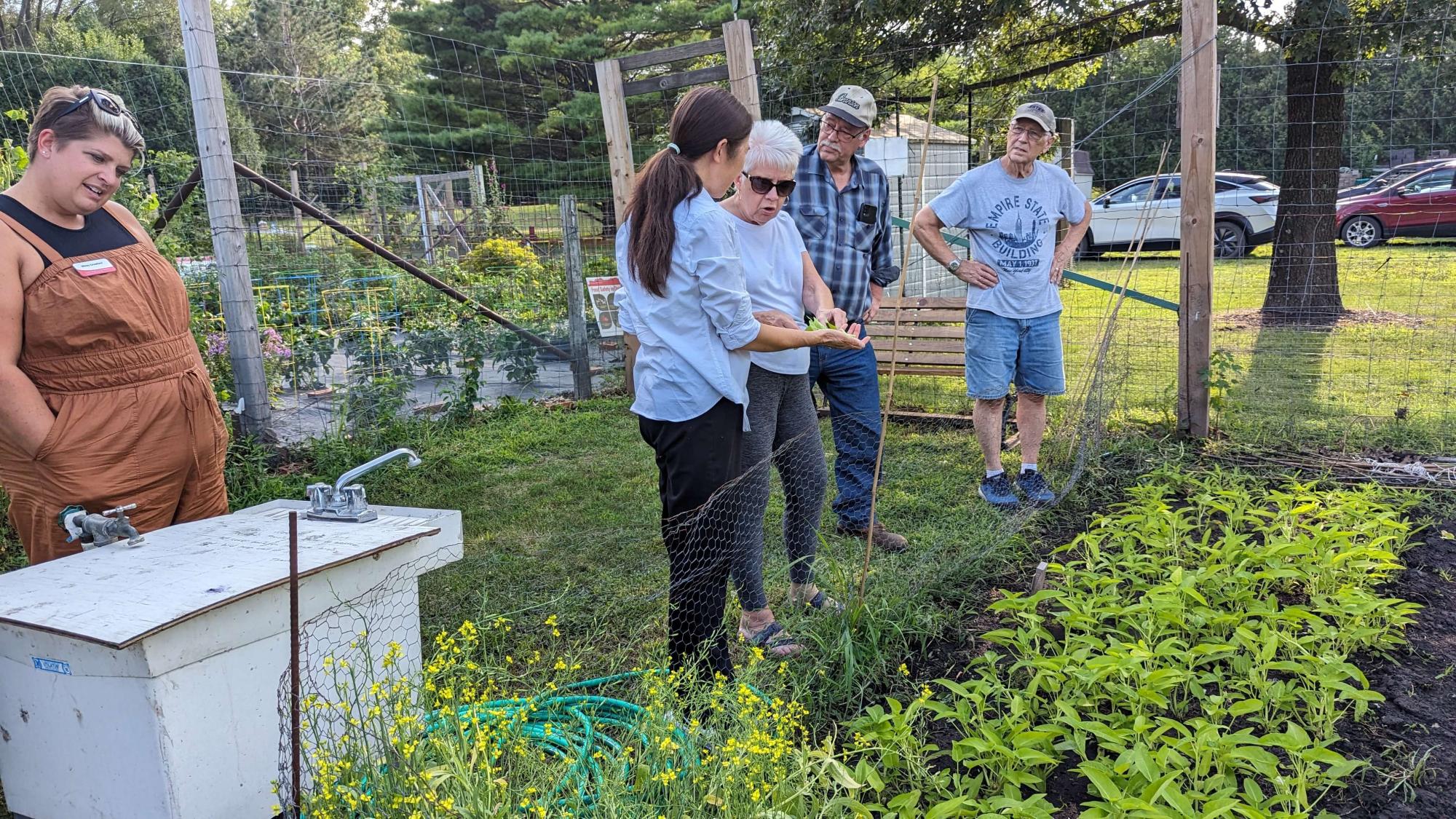 Sendy Chuong explains the unusual produce she grows at the Iowa Falls Community Garden