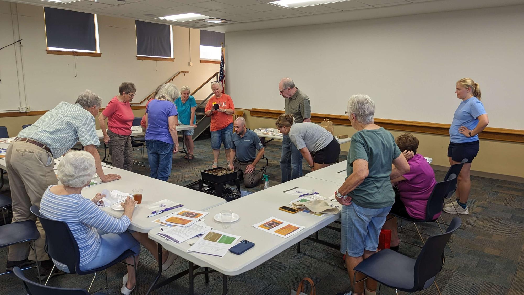 IWRC Environmental Specialist, Jason Clay is demonstrating vermicomposting to compost workshop attendees in Shenandoah.