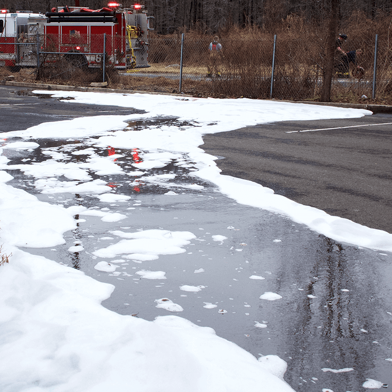 Link, Image, firefighting foam mixing with groundwater with fire truck in background, PFAS